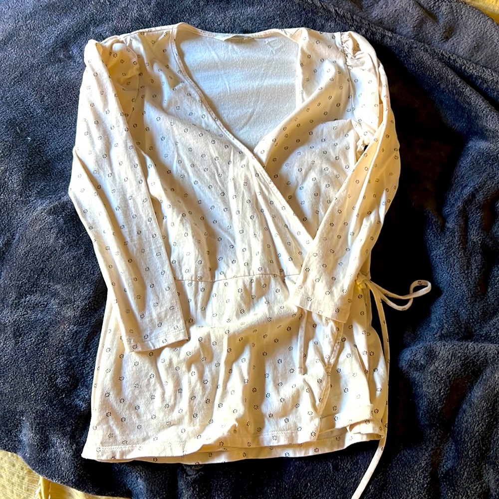 Beige, quarter length sleeve, wrap shirt.